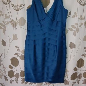 Jones wear teal layered formal dress